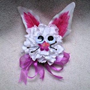 bunny corsage made with artificial flowers.