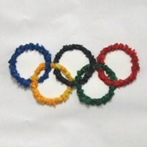 Olympic rings made from squares of tissue paper.