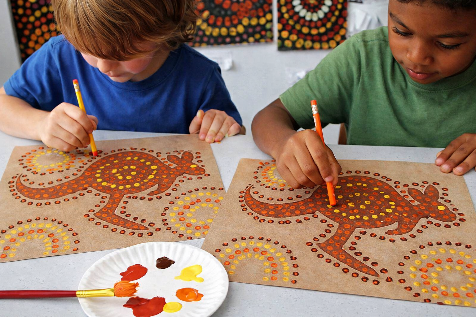 kids making dot painting of kangaroo