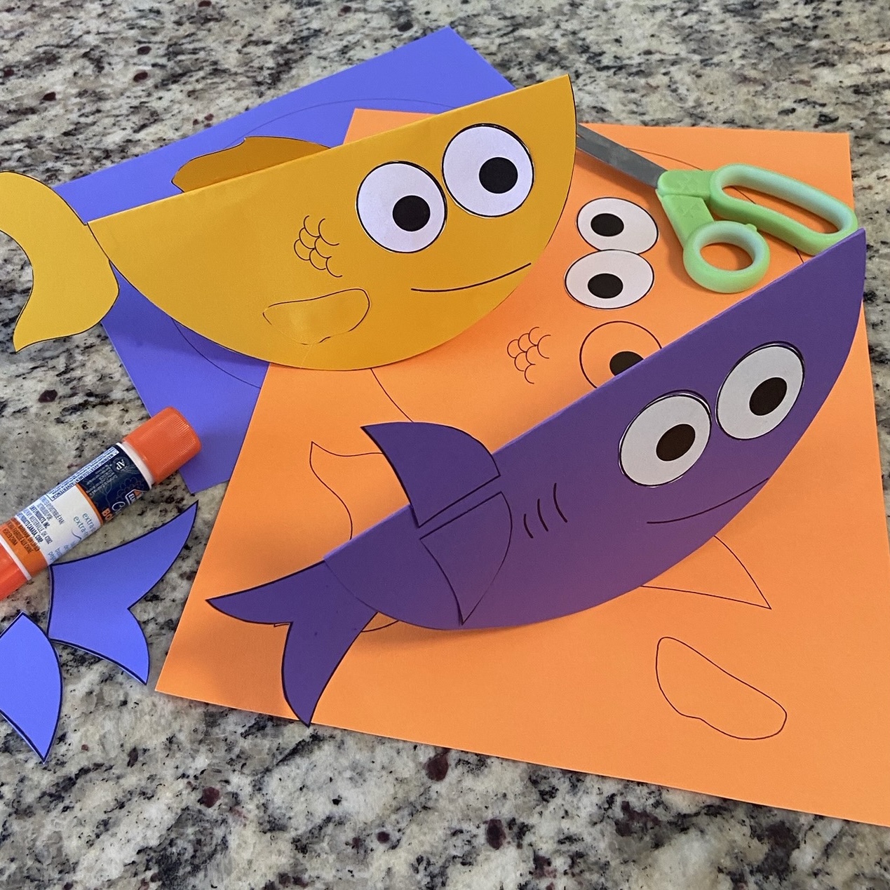 Easy folded goldfish and shark craft