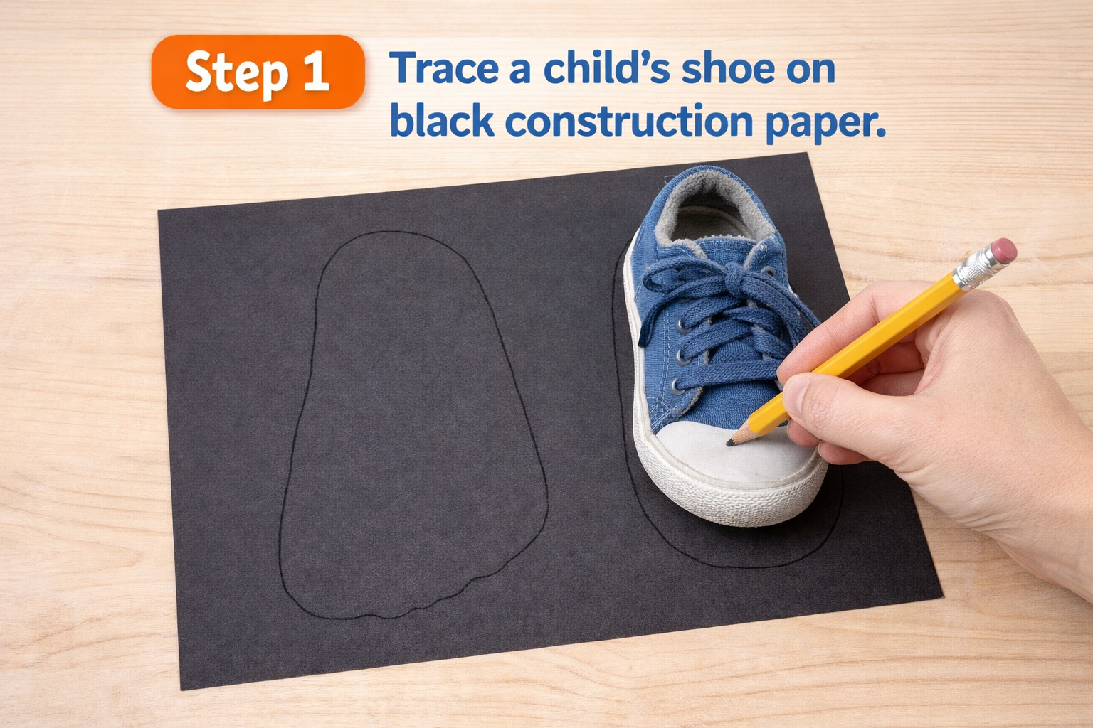 a shoe placed on top of construction paper