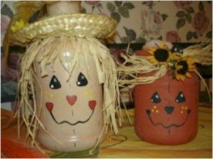 Decorative Scarecrow and pumpkin painted jars.